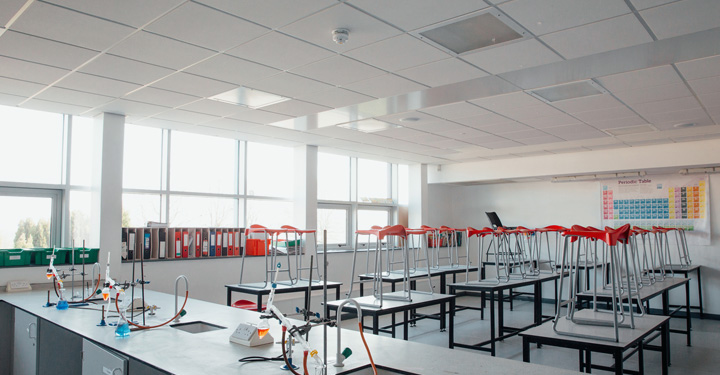 Empty classroom with presence detector, saving energy and supporting sustainability throughout education spaces